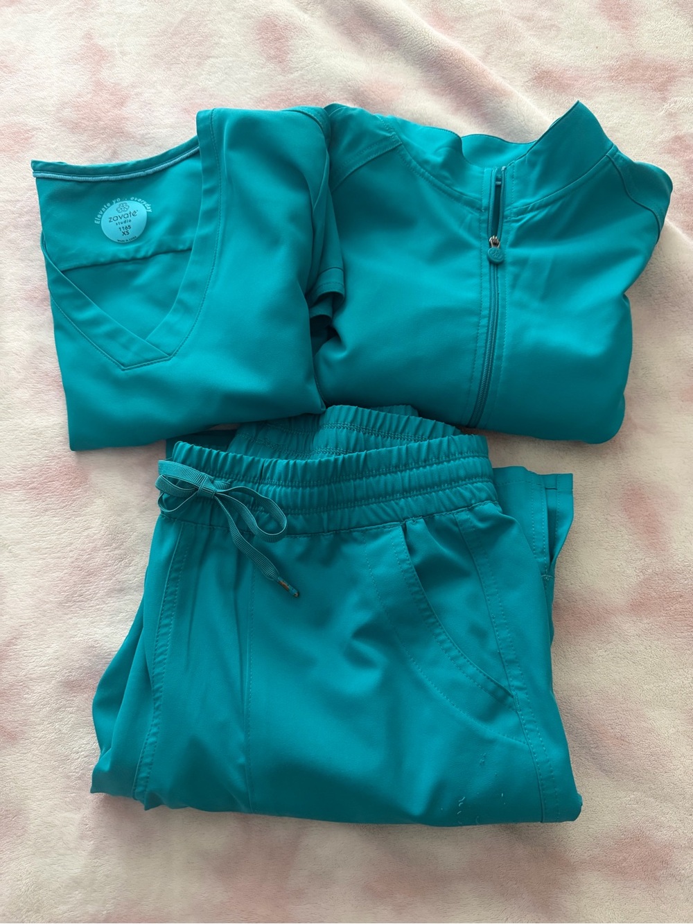 Womenโs Teal Scrub Top (XS), Jacket (XS), Pants (S)